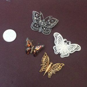 Four Vintage butterfly brooches